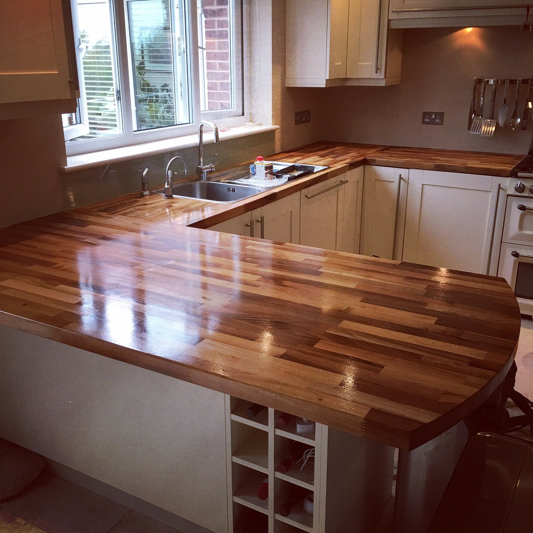solid walnut butchers block kitchen counters refinished and coated in Osmo, in Heswall, Wirral