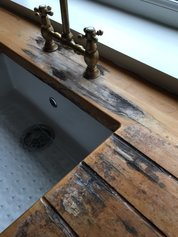 water damaged solid wood natural kitchen worktop and drainer - how to remove black mould stains from a wooden worktop